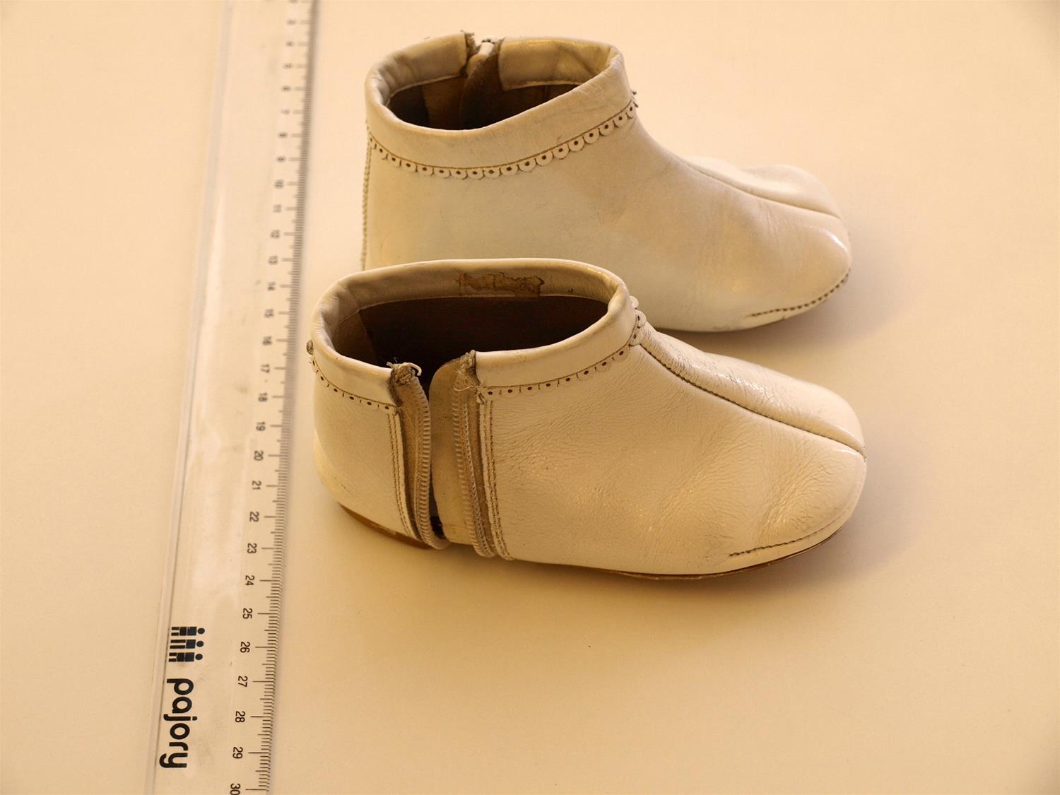 <span><p>Sapatos de crian�a</p></span>