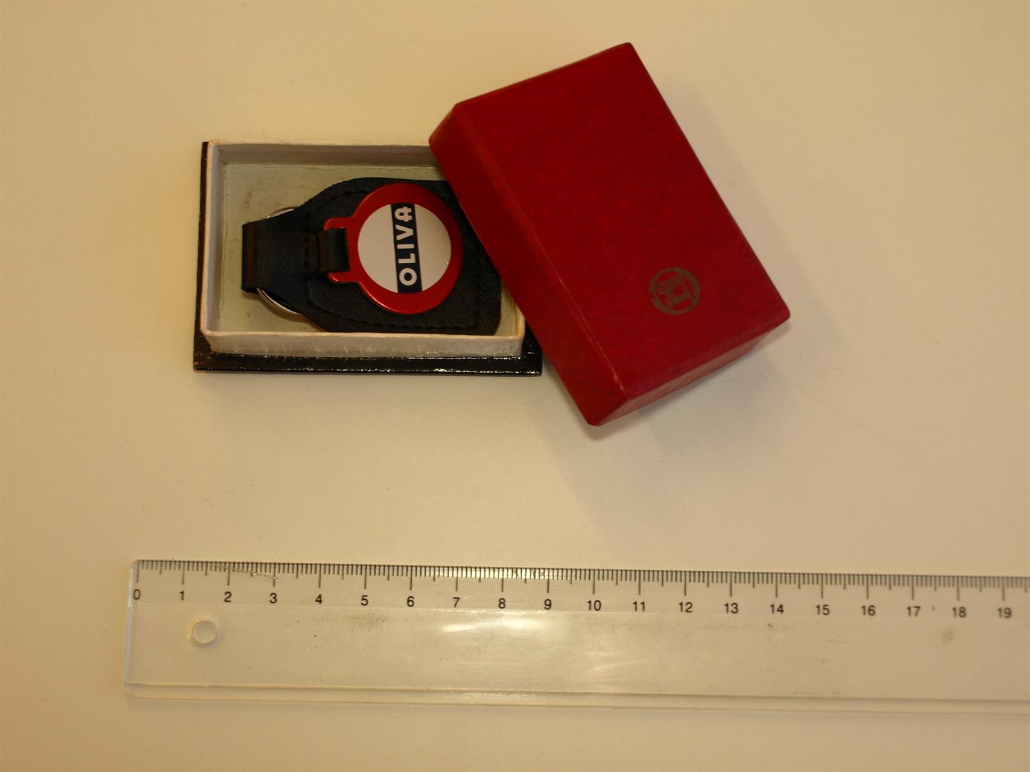 <span><p>Porta-chaves Oliva</p></span>