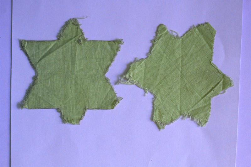 <span><p>Estrelas de David em tecido</p></span>