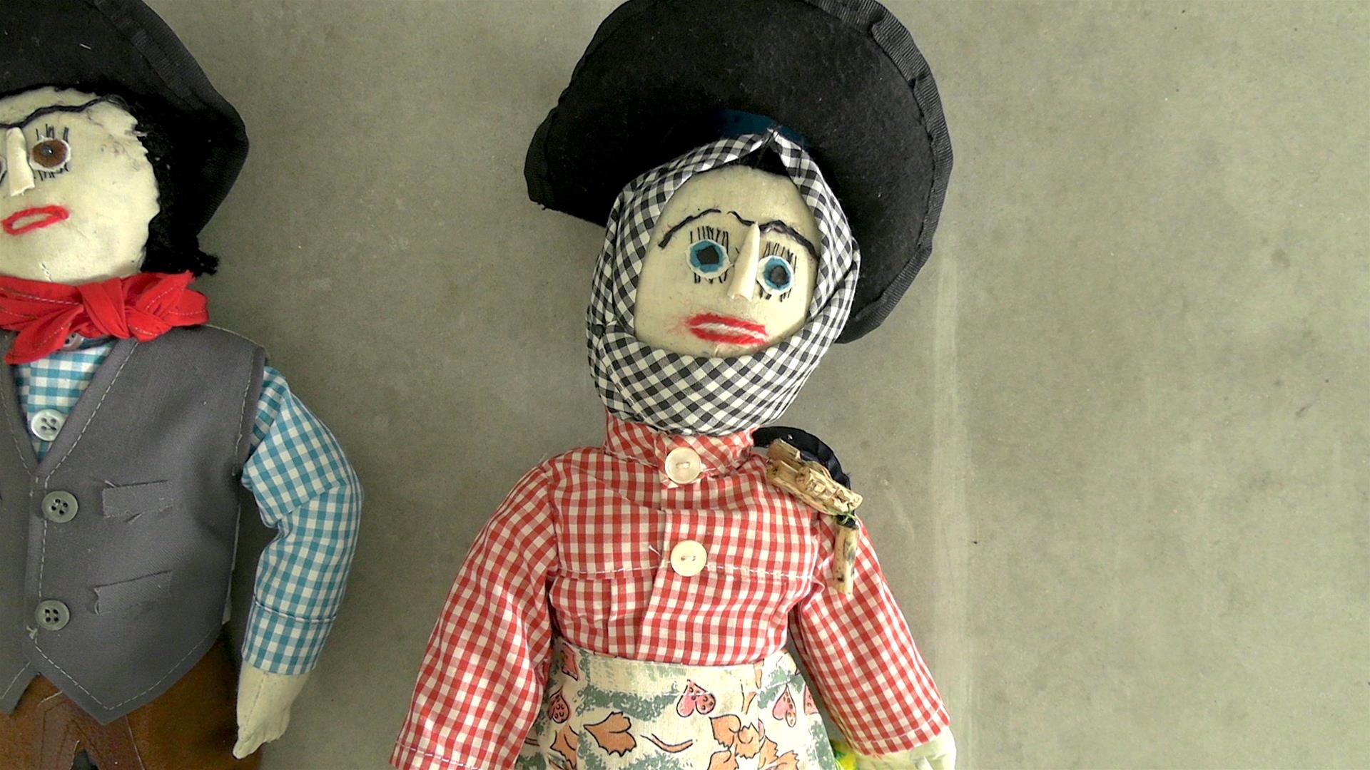 <span><p>Bonecos de pano</p></span>