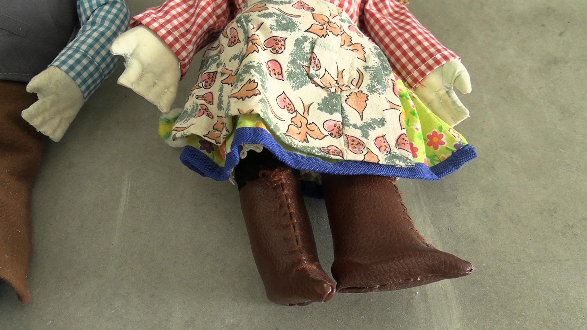 <span><p>Bonecos de pano</p></span>