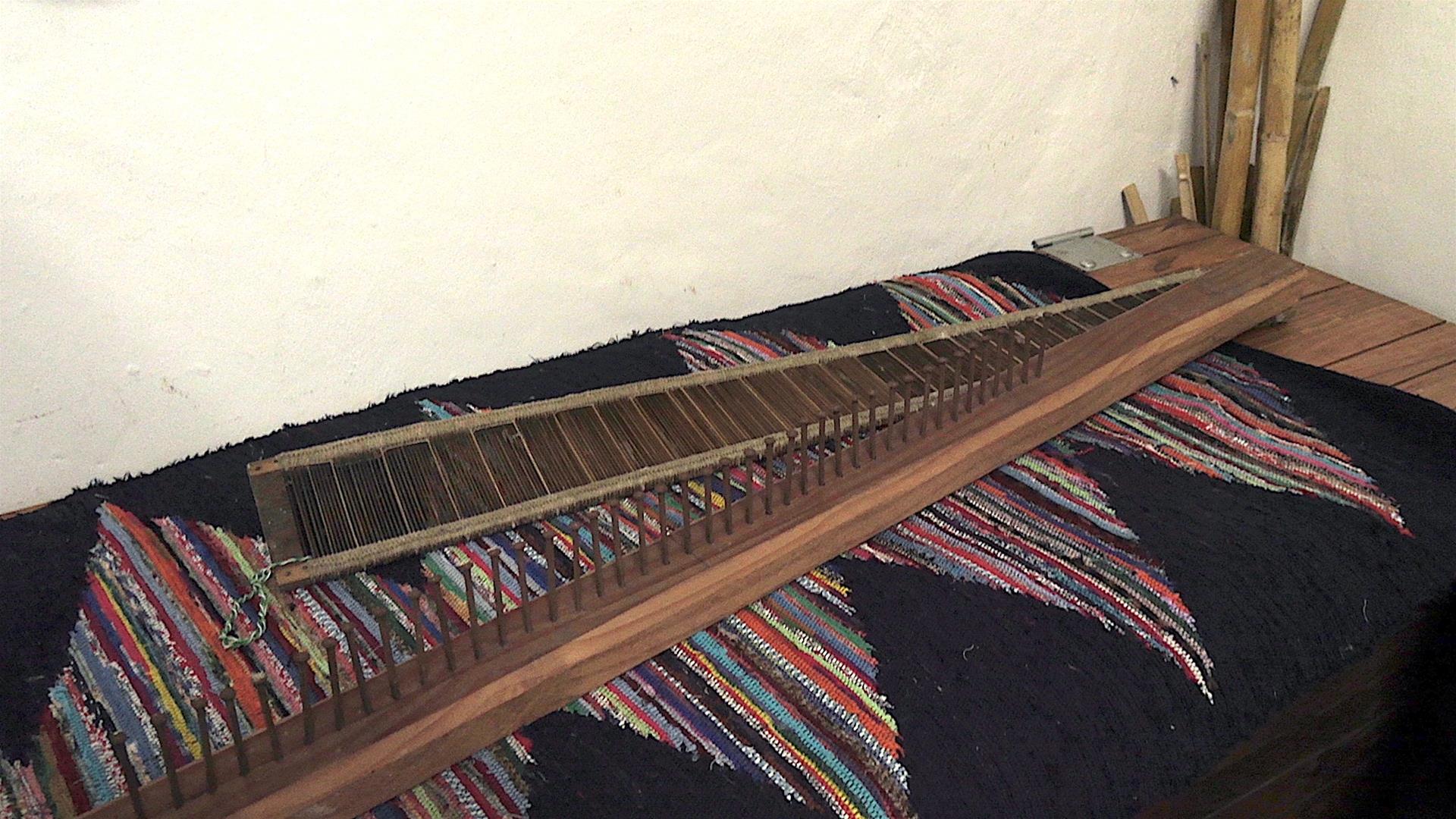 <span><p>Pente e restilho de tear</p></span>