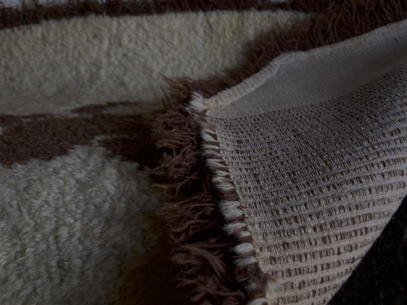 <span><p>Tapete de l� e linho com desenho de le�o</p></span>